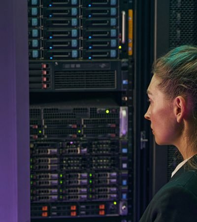 professional-young-woman-working-in-server-room-2024-10-18-08-37-11-utc professional-young-woman-working-in-server-room-2024-10-18-08-37-11-utc